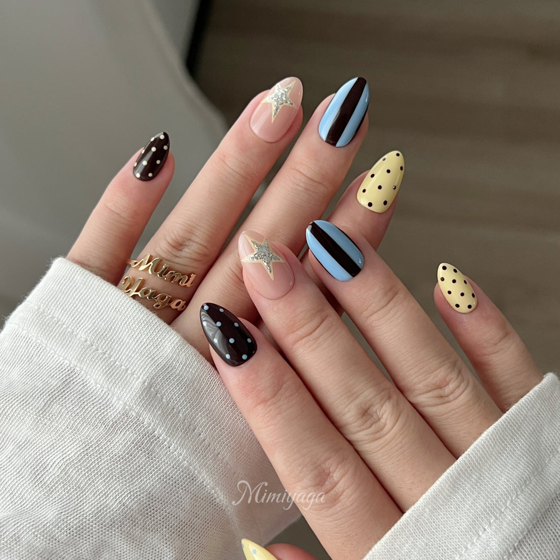 Lucky Theory handmade press on nails with polka dots, color blocking and silver star details