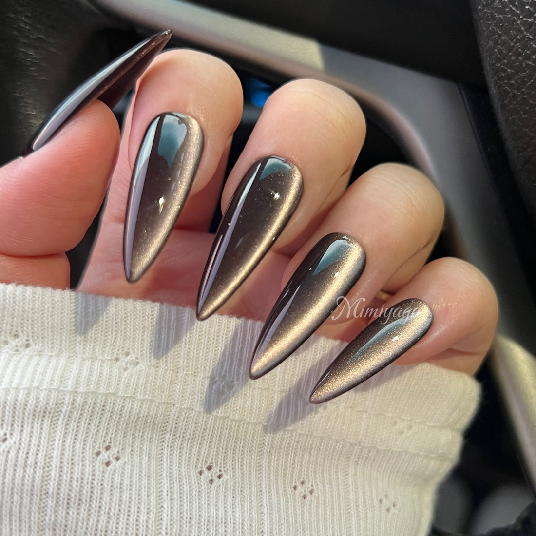Last Call deep burgundy brown cat eye press on nails with a champagne gold glow