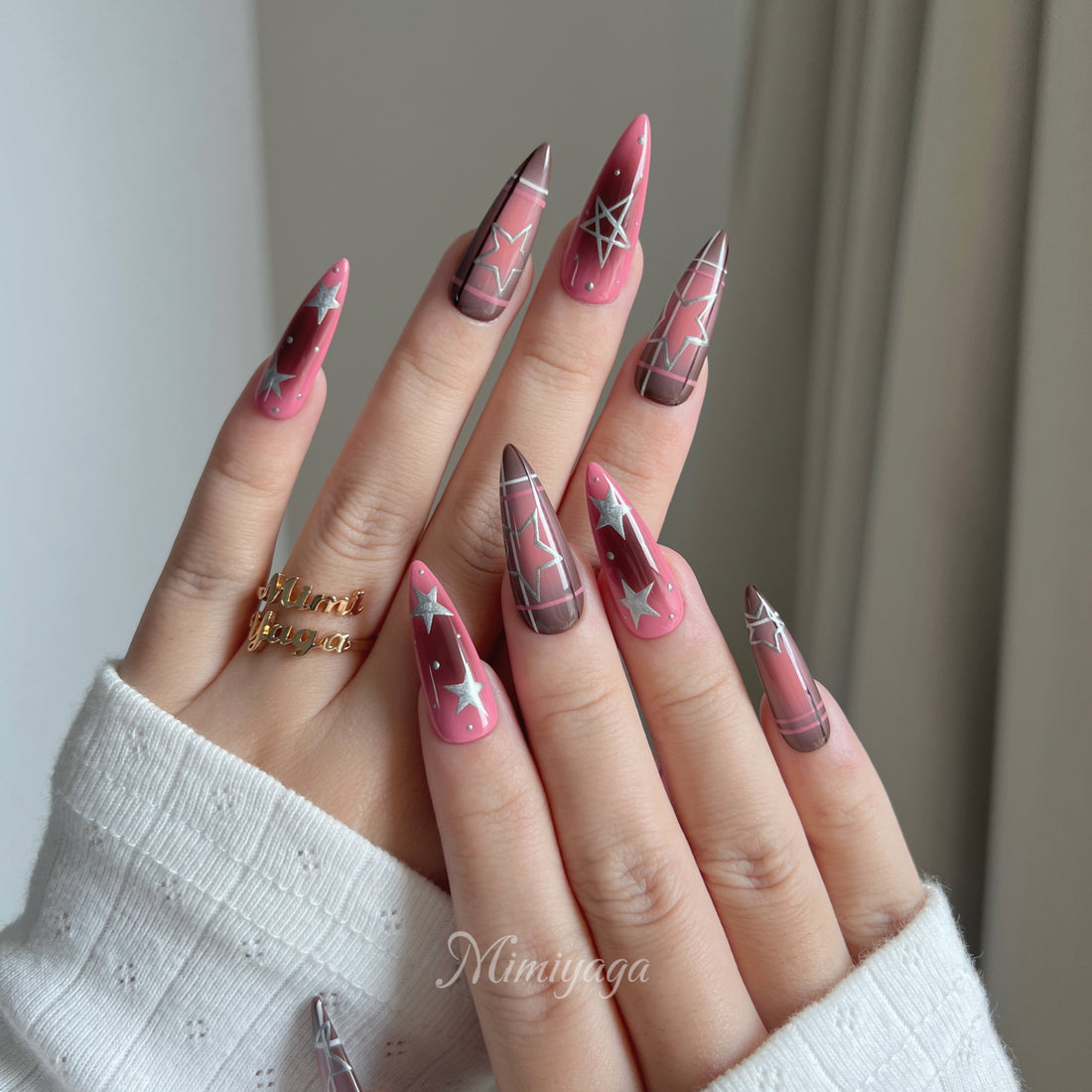 Pink Static handmade press on nails with soft pink, chocolate brown airbrush, silver stars and plaid details
