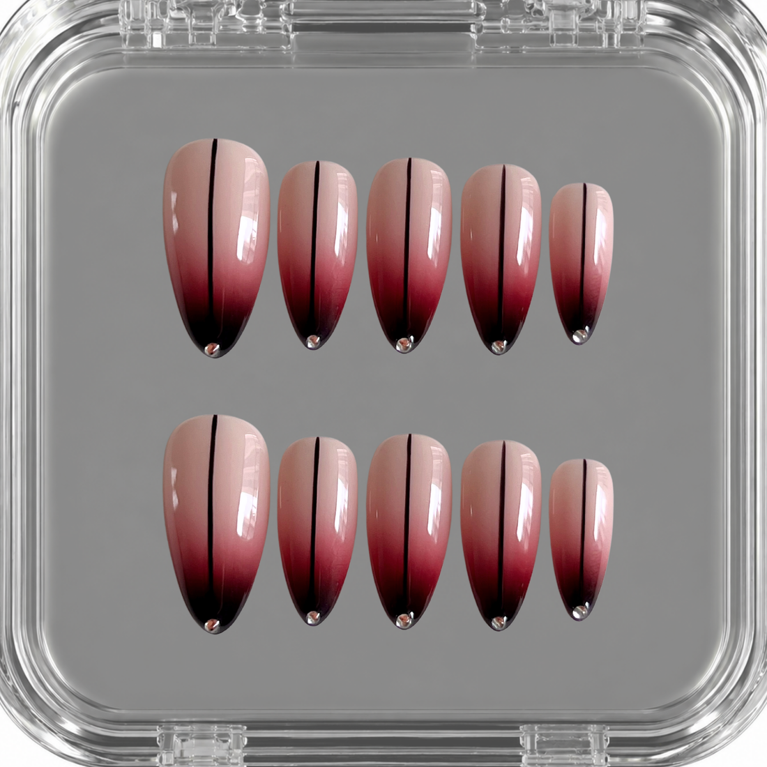 Velvet Reign handmade press on nails with blush, deep red and black airbrushed gradient, fine line details and crystal tips
